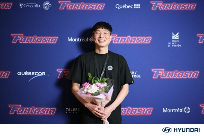 27일(현지시간) 캐나다 몬트리올에서 열린 제28회 판타지아 국제영화제에서 영화 '밤낚시'로 최고 편집상을 수상한 문병곤 감독이 소감을 말하고 있다.